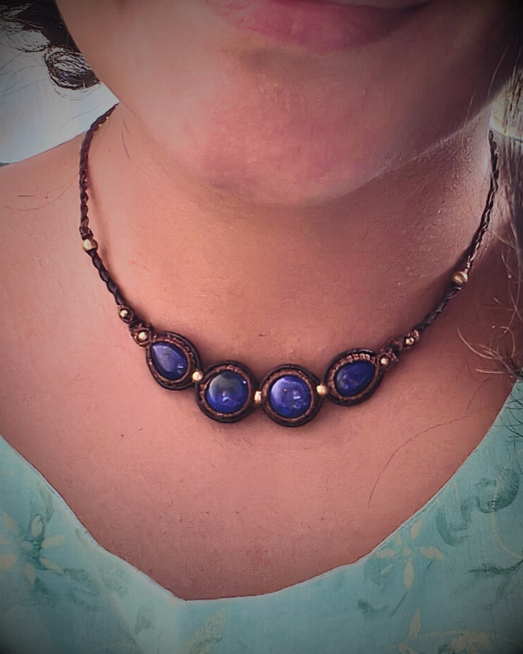 Handmade gemstone necklace with rich blue lapis lazuli stones.