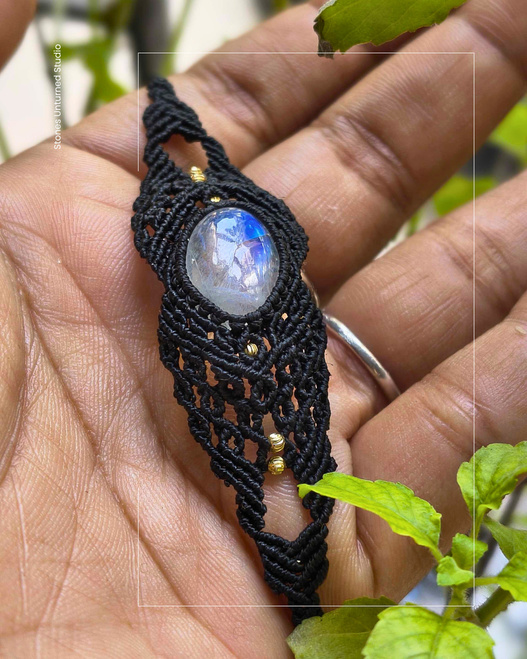 Handmade macramé moonstone bracelet with blue flash gemstone and brass bead details
