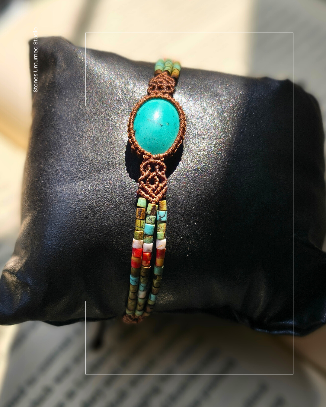 Close up of Iranian turquoise stone in handmade macrame bracelet.