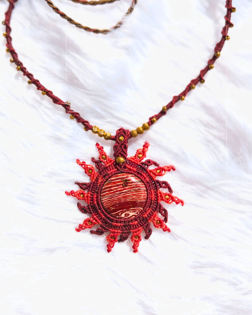 Celestial inspired macrame sun necklace with jasper stone and star-like brass bead accents