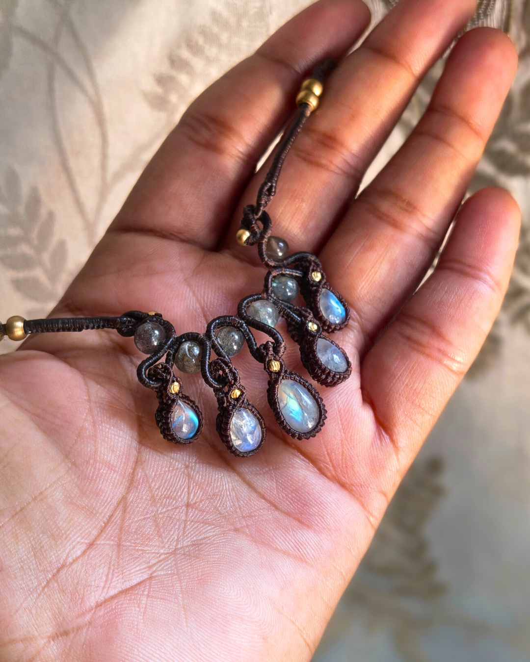 Close up of Rainbow moonstone and labradorite macrame necklace 