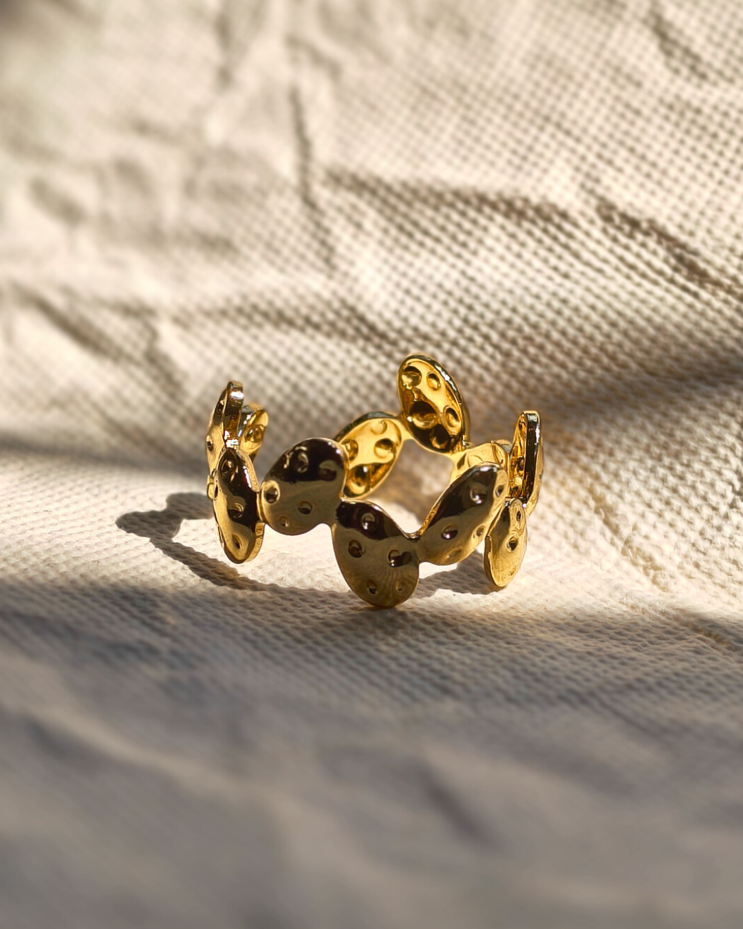 Gold pebble adjustable ring with organic stacked stone design