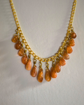 Handmade Helia Sunstone Drop Necklace featuring natural sunstone gemstone drops on a anti tarnish brass chain.