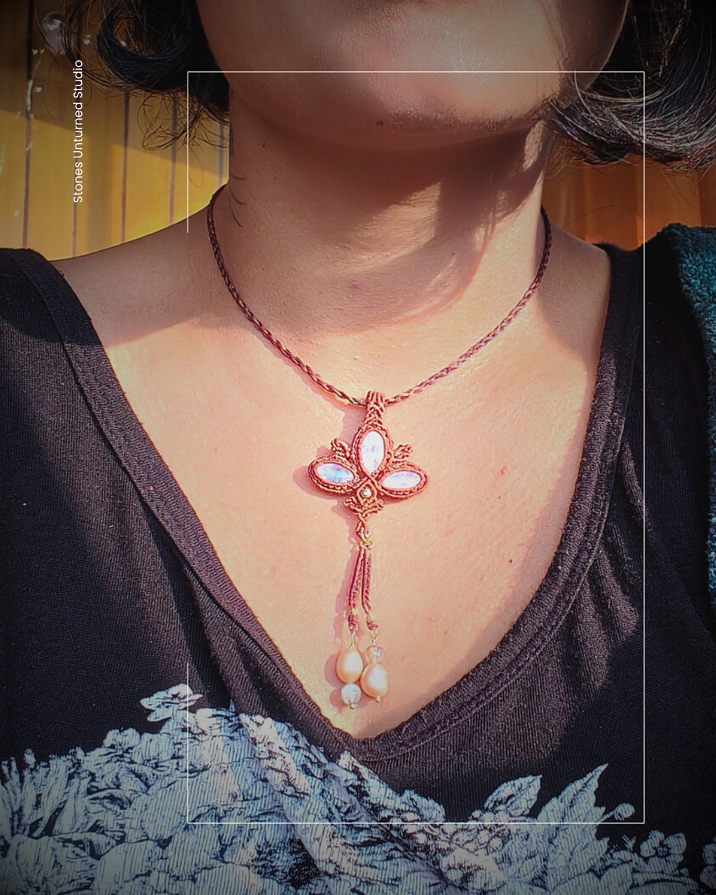 Boho lotus moonstone pendant with pearl and labradorite tassel drops on braided cord necklace.
