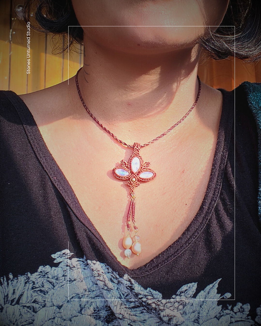 Boho lotus moonstone pendant with pearl and labradorite tassel drops on braided cord necklace.