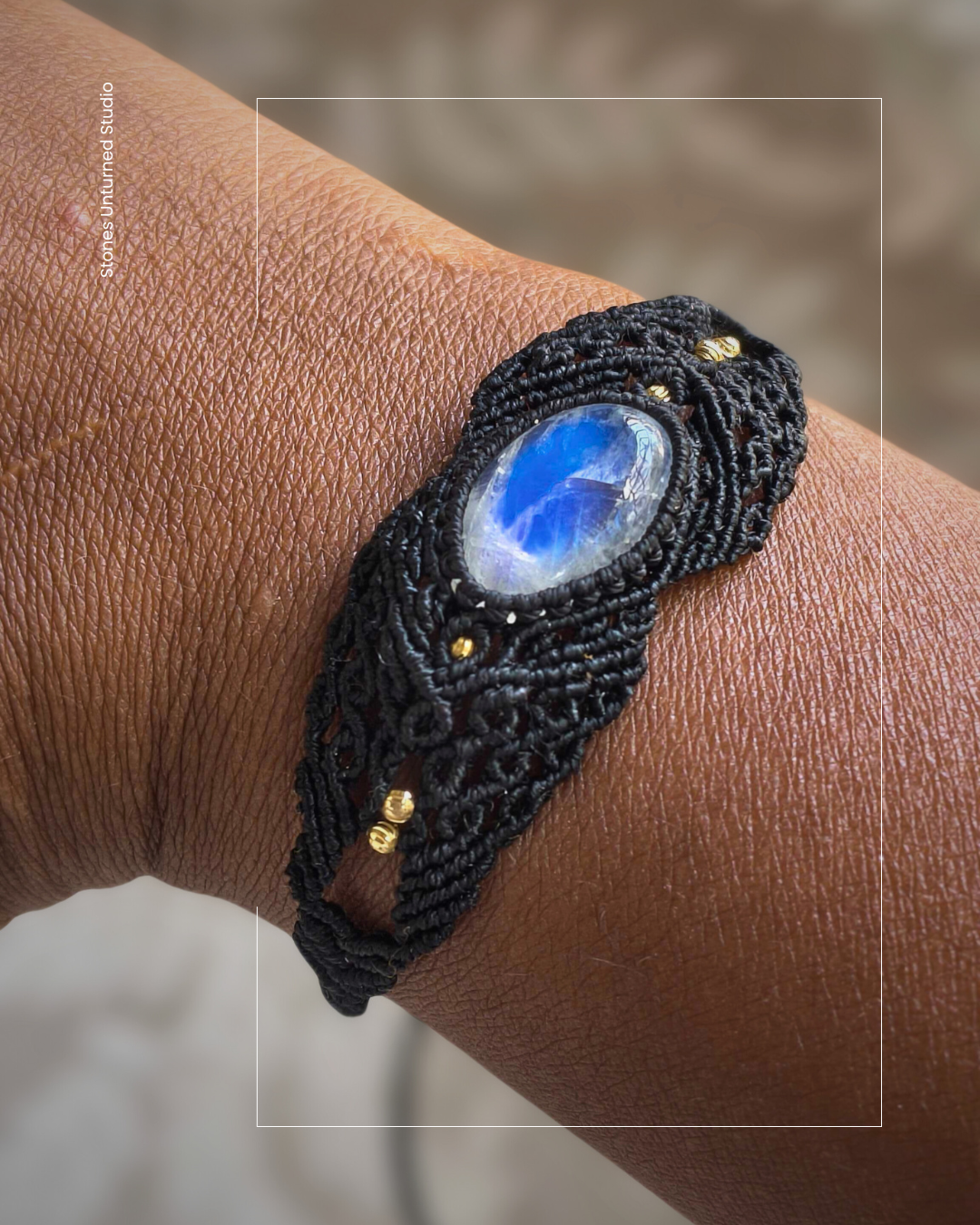 Bohemian moonstone bracelet handwoven with black macramé cord and glowing moonstone