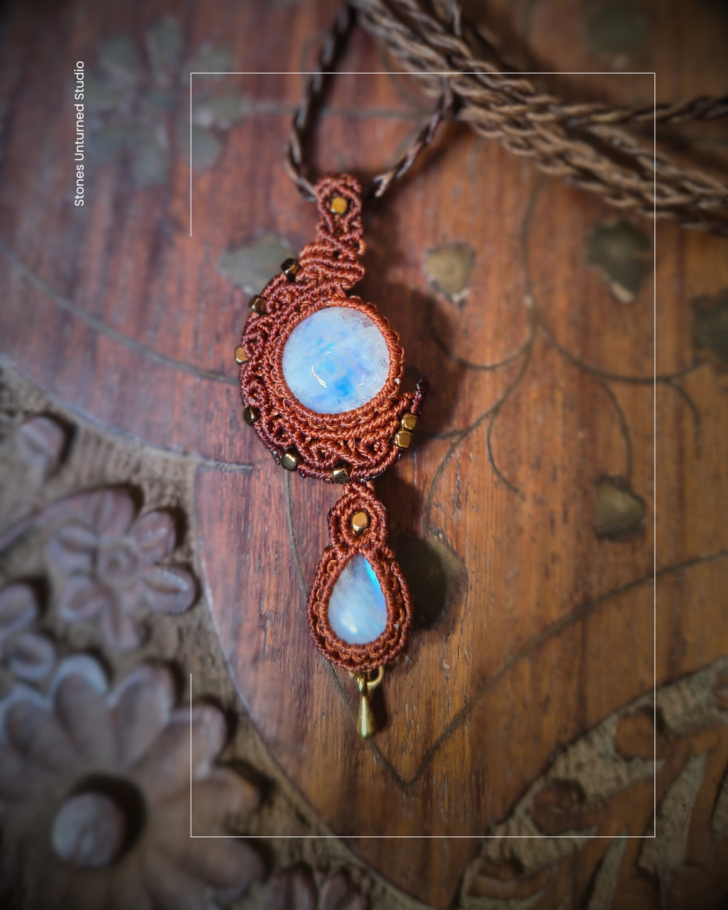 Bohemian moonstone crescent necklace handwoven in brown macramé cord with glowing moonstone
