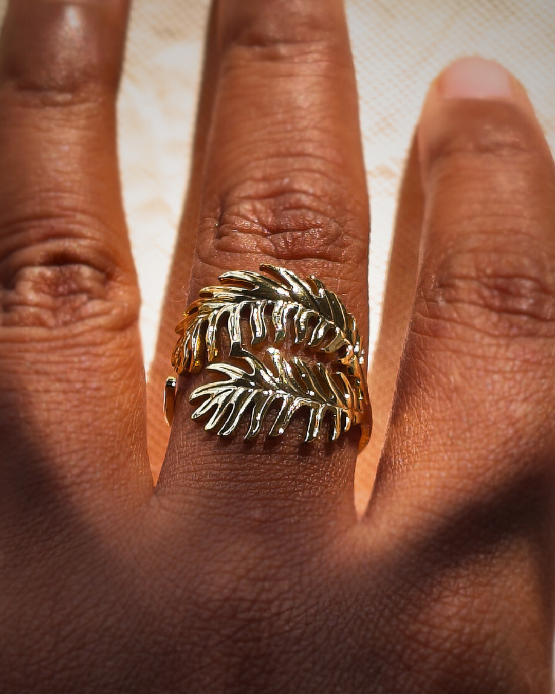Nature inspired adjustable fern ring with open band design 