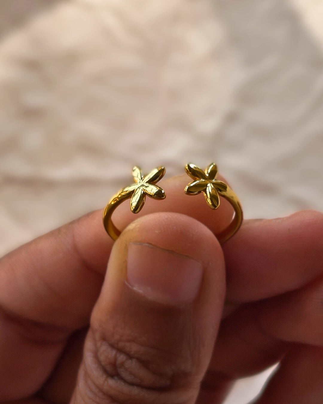 Gold plated stainless steel adjustable floral ring with two delicate flowers